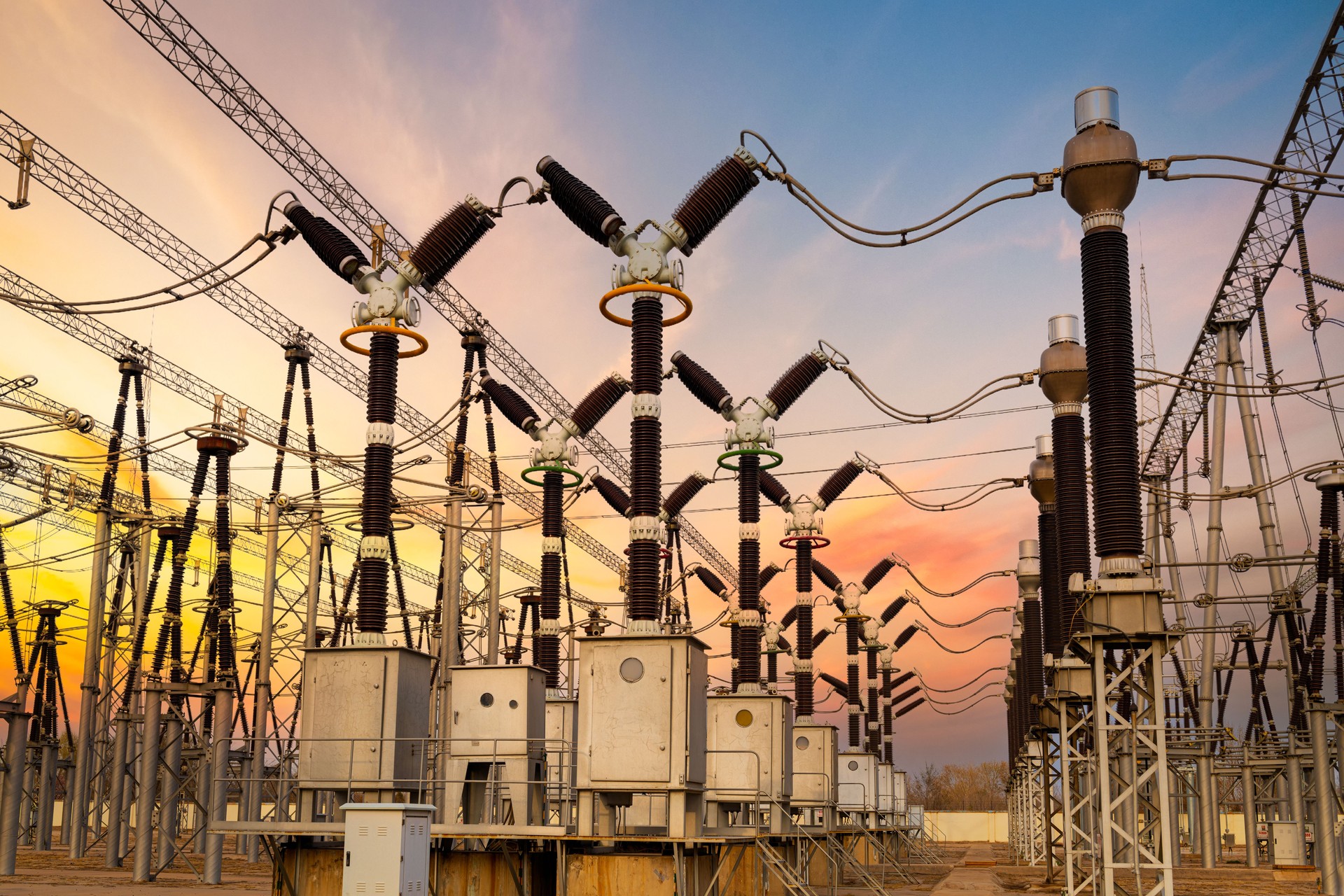 Delivery of electricity. High-voltage substation with power line and Insulator
